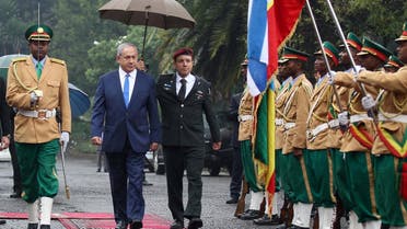 Israeli Prime Minister Benjamin Netanyahu inspects a guard of honor at the National Palace during his State visit to Addis Ababa, Ethiopia, July 7, 2016. REUTERS