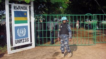 A U.N. peacekeeper stands outside a camp for internally displaced people in the United Nations Mission in South Sudan (UNMISS) compound in Tomping, Juba, South Sudan, July 11, 2016. Beatrice Mategwa/United Nations Mission in South Sudan (UNMISS)/Handout via REUTERS 