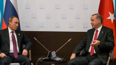 Russian President Vladimir Putin, left, and Turkish President Recep Tayyip Erdogan talk to each other in Antalya summit on Nov. 16, 2015. (AP)