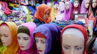 EU court split on headscarf bans 