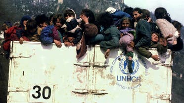 Muslims refugees in an overloaded UNHCR truck March 31, 1993 during evacuation from besieged Srebrenica as part of agreement between Serbs. On July 11, 1995. (Reuters)