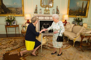 [Window Title] Save As  [Content] Queen Elizabeth II welcomes Theresa May, left, at the start of an audience in Buckingham Palace, London, where she invited the former Home Secretary to become Prime Minister and form a new government, Wednesday July 13, 2016. (AP) The file name is not valid.  [OK]