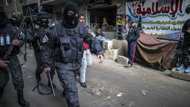 Members of the Egyptian police special forces patrol streets in al-Haram neighbourhood in the southern Cairo Giza district. (File photo: AFP)