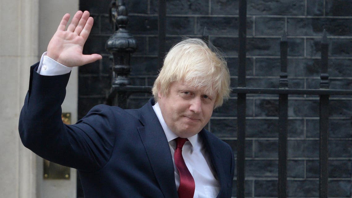 Newly appointed Foreign Secretary Boris Johnson waves as he leaves 10 Downing Street in central London on July 13, 2016 after new British Prime Minister Theresa May took office. (AFP)