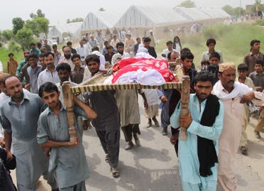 Pakistani relatives and residents carry the coffin of social media celebrity, Qandeel Baloch during her funeral in Shah Sadar Din village, around 130 kilometers from Multan on July 17, 2016. (AFP)