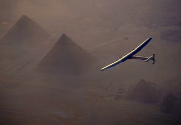 In this Wednesday, July 13, 2016, handout image provided by Solar Impulse, the Solar Impulse 2 flying over the pyramids, Egypt Cairo. The experimental solar-powered airplane has arrived in Egypt as part of its global voyage. (Jean Revillard, Rezo via the AP, File)