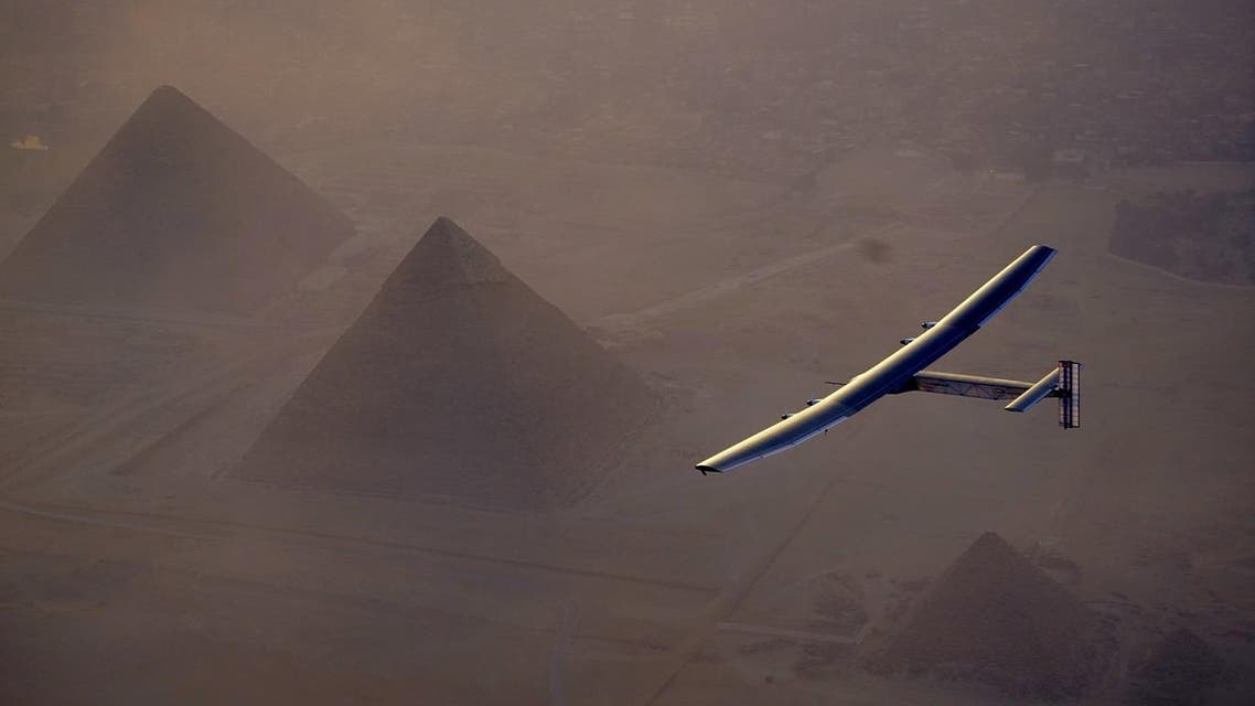 In this Wednesday, July 13, 2016, handout image provided by Solar Impulse, the Solar Impulse 2 flying over the pyramids, Egypt Cairo. The experimental solar-powered airplane has arrived in Egypt as part of its global voyage. (Jean Revillard, Rezo via the AP, File)