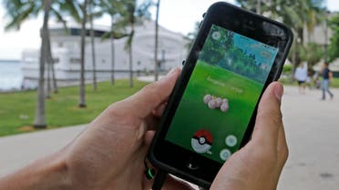 Exeggcute, a Pokemon, is found by a Pokemon Go player, Tuesday, July 12, 2016, at Bayfront Park in downtown Miami.