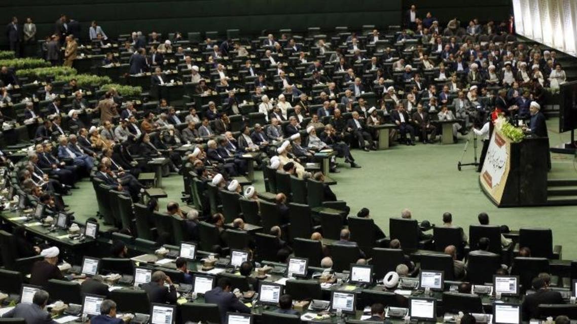 Iranian President Hasan Rouhani (R) delivers a speech during the opening session of the new parliament in Tehran on May 28, 2016. (File: AFP)