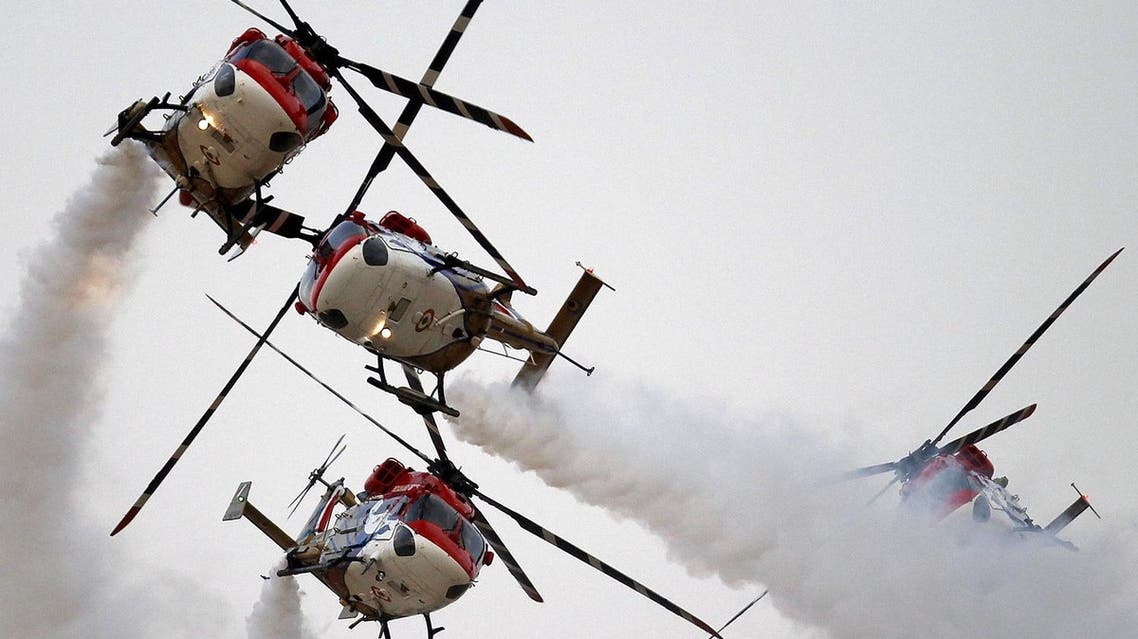 The Indian Air Force Sarang helicopter team pictured during an exercise at Pokhran in the state of Rajasthan, India, March 18, 2016. REUTERS