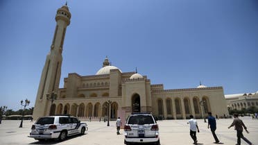 Police patrol vehicles are parked outside the main entrances of Bahrain Sunni Grand Mosque, where joint Sunni and Shi'ites Friday prayers were held to show solidarity and co-existence between the two sects of Islam, in Juffair east of Manama, Bahrain, July 10, 2015. In reaction to three bombings of Shi'ite mosques by the Islamic State militant group in Saudi Arabia and Kuwait since May 22, Sunnis and Shi'ites in Kuwait and Bahrain will pray together in main mosques as a sign of inter-sectarian unity. REUTERS