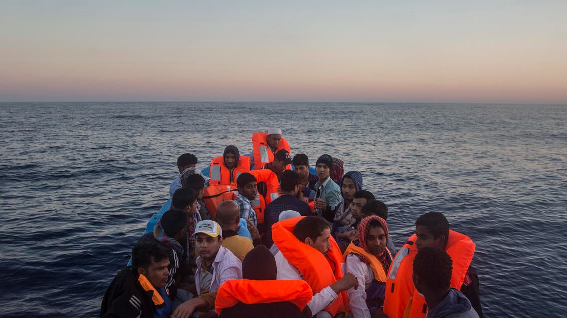 Refugees and migrants overcrowd a wooden boat during a rescue operation on the Mediterranean sea, about 19 miles north of Az Zawiyah, Libya, on Thursday, July 21, 2016. (AP)
