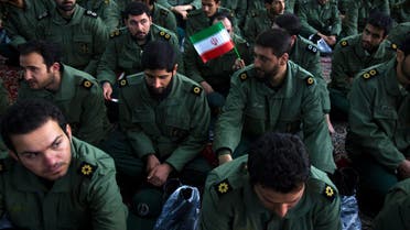Members of the revolutionary guard attend the anniversary ceremony of Iran’s Islamic Revolution at the Khomeini shrine in the Behesht Zahra cemetery, south of Tehran, February 1, 2012. (File photo: Reuters)