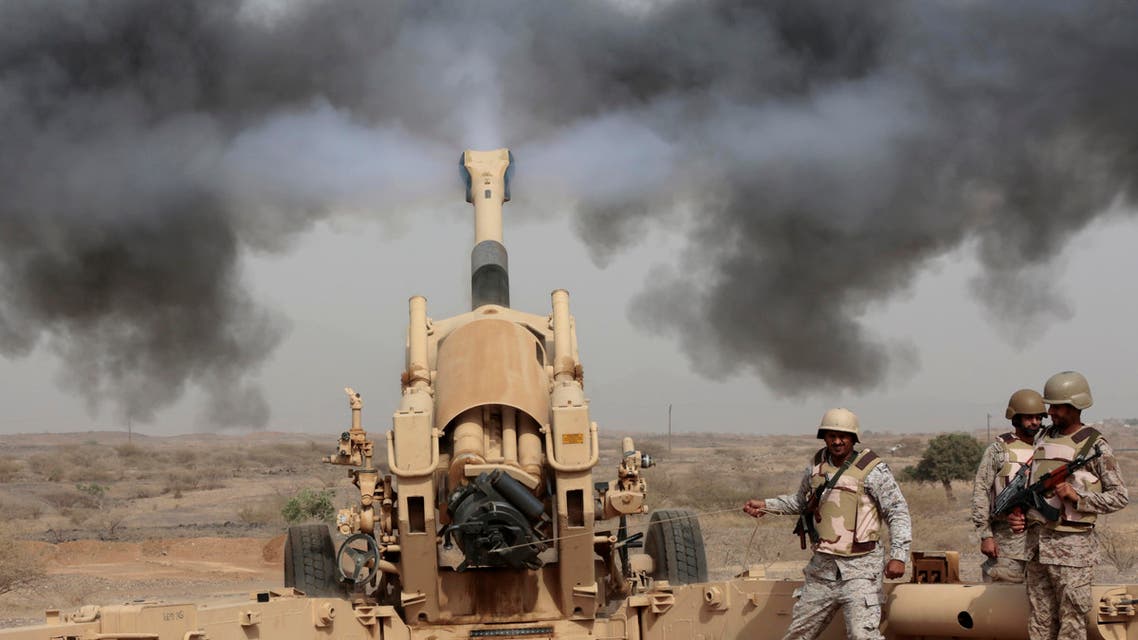 In this Monday, April 20, 2015, file photo, Saudi soldiers fire artillery toward three armed vehicles approaching the Saudi border with Yemen in Jazan, Saudi Arabia. AP