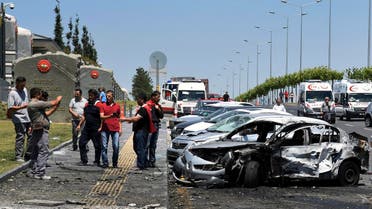 In this photo taken on Saturday July 16, 2016 and released Thursday, July 22, 2016, destroyed cars from overnight fighting during the attempted coup are seen outside the Presidential palace in Ankara. (Presidencial Press Service/Pool Photo via AP)