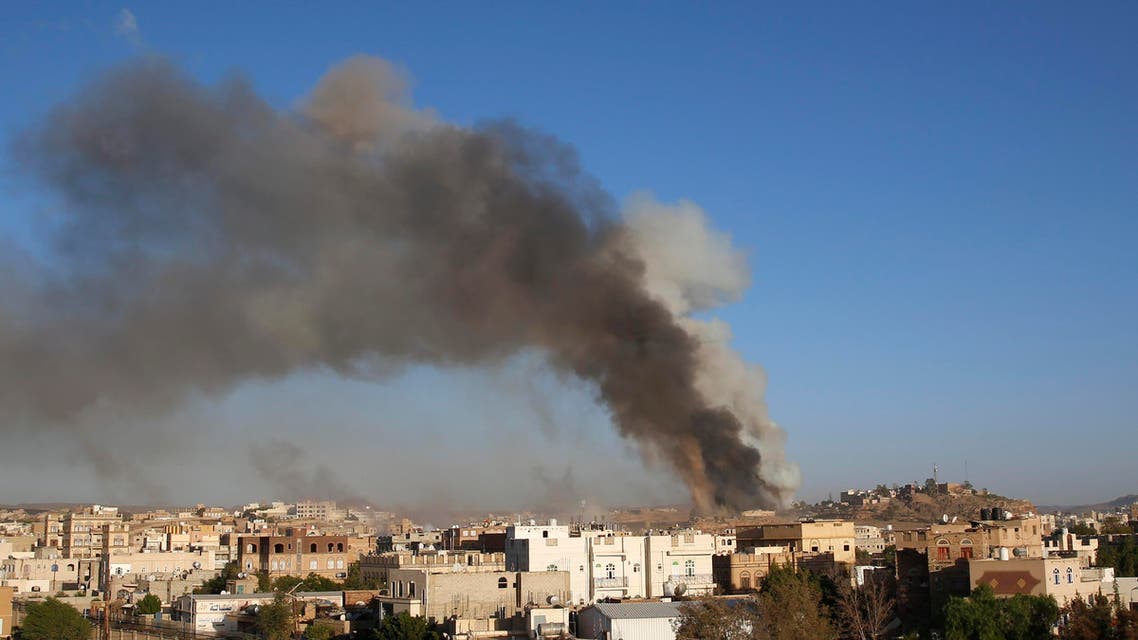 In this Sept. 11, 2015 file photo, smoke rises after an airstrike by the Saudi-led coalition at a weapons depot in Sanaa, Yemen. AP