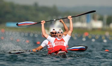 Russia's Yury Postrigay and Alexander Dyachenko row in the men's kayak double (K2) 200m event at Eton Dorney during the London 2012 Olympic Games August 11, 2012.  (Reuters)