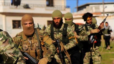 This file photo posted on the Twitter page of Syria's al-Qaida-linked Nusra Front on April 1, 2016, shows fighters from al-Qaida's branch in Syria, ap
