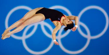 Russia's Yulia Koltunova performs a dive during the women's 10m platform semi-final at the London 2012 Olympic Games at the Aquatics Centre August 9, 2012. REUTERS/Toby Melville (BRITAIN - Tags: OLYMPICS SPORT DIVING)