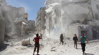 Four children among 28 civilians dead in air strikes on Syria safe zone