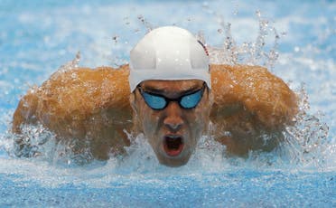 Michael Phelps competes in a heat of the men's 400-meter individual medley at the 2012 Summer Olympics in London. AP
