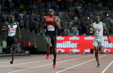 Usain Bolt of Jamaica, centre,runs onto win the men's 200 meter race during the Diamond League anniversary games at The Stadium, in the Queen Elizabeth Olympic Park in London, Friday, July 22, 2016. (AP)