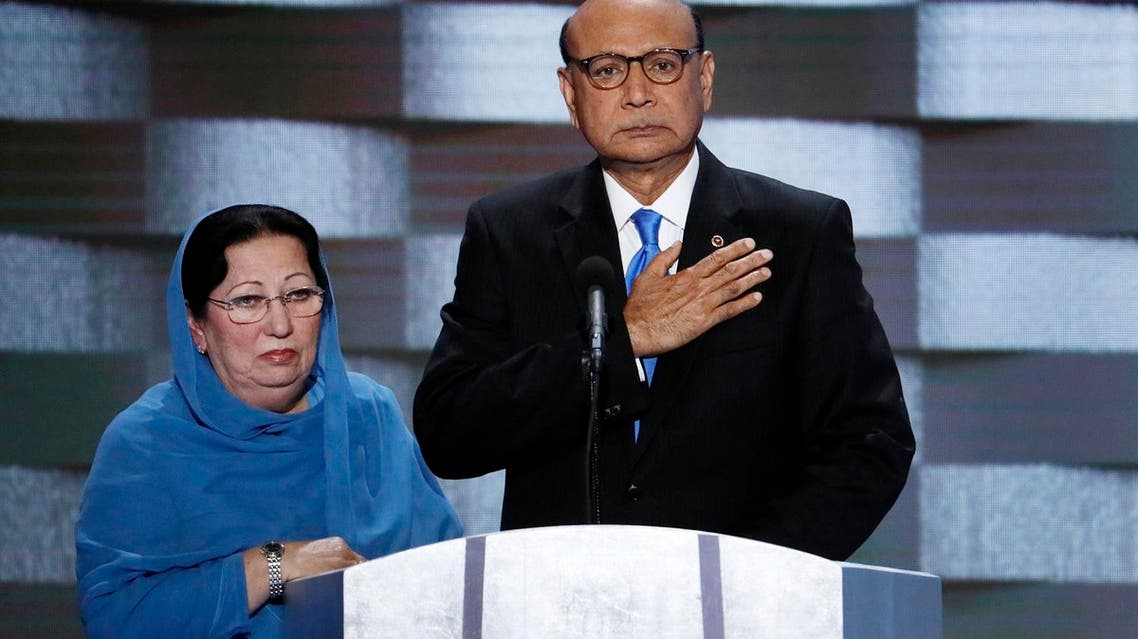 Khizr Khan, father of fallen US Army Capt. Humayun S. M. Khan and his wife Ghazala speak during the final day of the Democratic National Convention in Philadelphia , Thursday, July 28, 2016. (AP Photo/J. Scott Applewhite)