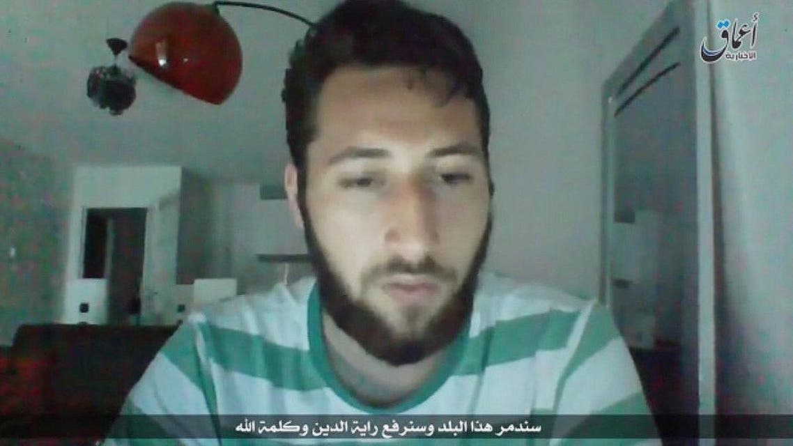 Abdel Malik Petitjean makes threats against France and directly addresses French President Francois Hollande and Prime Minister Manuel Valls. (Photo courtesy: Amaq)