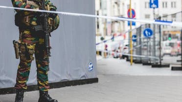  AFP I An armed soldier stands behind a cordon in central Brussels on July 20, 2016 