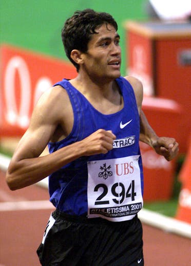Ali Saidi-Sief of Algeria crosse the finish line to win the 1500m race at the Lausanne Grand Prix athletics meeting in Lausanne July 4, 2001. Sief won the race in a time of three minutes 29.51 seconds. (Reuters)