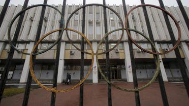 A view through a fence shows the Russian Olympic Committee headquarters, which also houses the management of Russian Athletics Federation in Moscow, Russia, November 10, 2015. The Russian Sports Ministry said on Tuesday it was open for closer cooperation with the World Anti-Doping Agency (WADA) in order to eliminate any irregularities committed by the Russian anti-doping watchdog and its accredited laboratory. WADA has recommended that Russian athletes are excluded from international events including the 2016 Olympic Games in Brazil. REUTERS