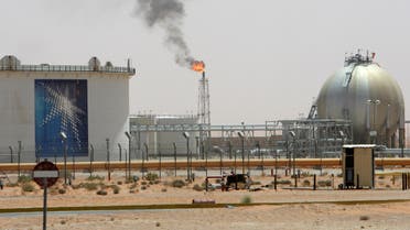 A gas flame is seen in the desert near the Khurais oilfield, about 160 km (99 miles) from Riyadh, Saudi Arabia June 23, 2008. REUTERS/