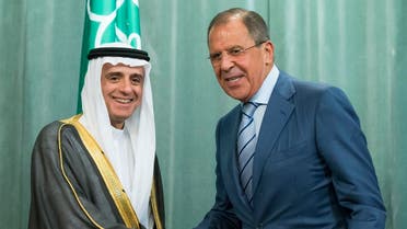 Russian Foreign Minister, Sergey Lavrov, right, and Saudi Arabia Foreign Minister, Adel bin Ahmed Al-Jubeir, shake hands after a news conference last summer. (File photo: AP)