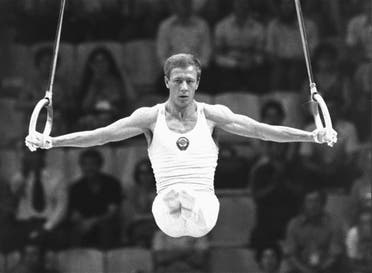 Nikolai Andrianov of the Soviet Union works with the rings in men's gymnastics in Moscow Olympics Thursday evening July 24, 1980. Andrianov captured the silver medal in the event as the gold was won by teammate Alexandr Distyatin. (AP)
