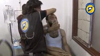 Rescuers say gas dropped on Syrian town where Russian copter downed