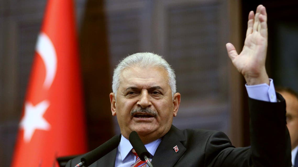 Turkish Prime Minister Binali Yildirim speaks during a meeting of his Turkish ruling Justice and Development Party (AKP) group at the Grand National Assembly of Turkey (TBMM) in Ankara on August 2, 2016. AFP