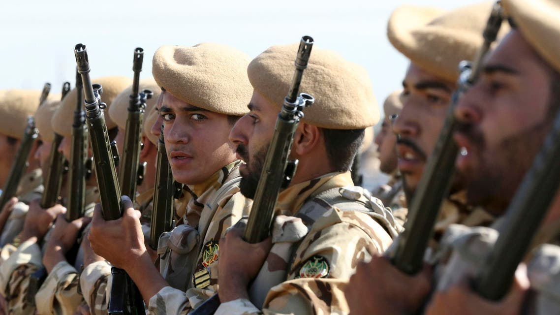Iranian army troops conclude their march in a military parade marking the 35th anniversary of Iraq's 1980 invasion of Iran, in front of the shrine of late revolutionary founder Ayatollah Khomeini, just outside Tehran, Iran, Tuesday, Sept. 22, 2015. (AP)