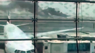 Video shows panic inside flaming Emirates jet