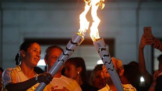 Torch alights on Rio shore ahead of Games’ opening