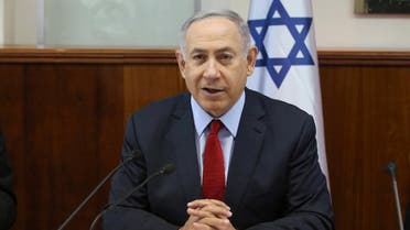 Israeli Prime Minister Benjamin Netanyahu opens the weekly cabinet meeting at his Jerusalem office. (Reuters)
