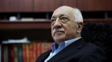 In this March 15, 2014 file photo, Turkish Muslim cleric Fethullah Gulen, sits at his residence in Saylorsburg, Pa.In a dispute between NATO allies, Turkey demands that the United States extradite Fethullah Gulen, a Pennsylvania-based Turkish cleric, to face charges of engineering a coup attempt. But despite indications that his followers were behind the failed military uprising, analysts say concerns about whether Gulen could get a fair trial complicate Turkey’s bid. (AP Photo/Selahattin Sevi, File)