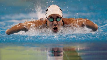 Farida Osman of Egypt swims during the women's 100m butterfly final at the Arab Games in Doha December 17, 2011. REUTERS