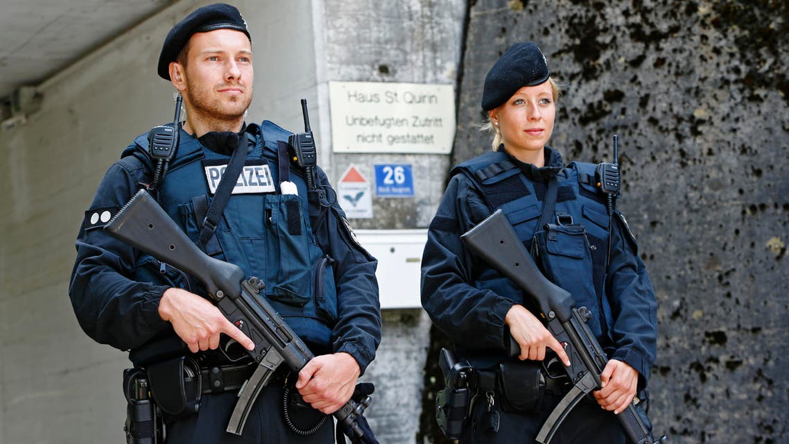 Police guards conference building before the Christian Social Union (CSU) meeting in Sankt Quirin, Germany July 26, 2016. REUTERS