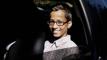 In this Sept. 17, 2015 file photo, Ahmed Mohamed sits in a vehicle before leaving his family's home in Irving, Texas. The family of Ahmed Mohamed, who was arrested after a homemade clock he brought to school was mistaken for a bomb, filed a lawsuit Monday, Aug. 8, 2016, against Texas school officials saying they violated the boy's civil rights. (AP Photo/LM Otero, File)  Use Information This conte