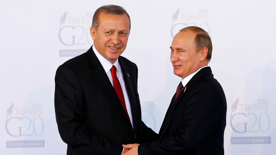 This file photo taken on November 15, 2015 shows Turkish President Recep Tayyip Erdogan (L) greeting Russian President Vladimir Putin (R). (AFP)