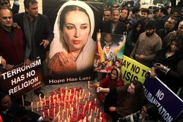 Supporters of Pakistan's slain leader Benazir Bhutto take part in a memorial in Lahore, Pakistan. (AP)