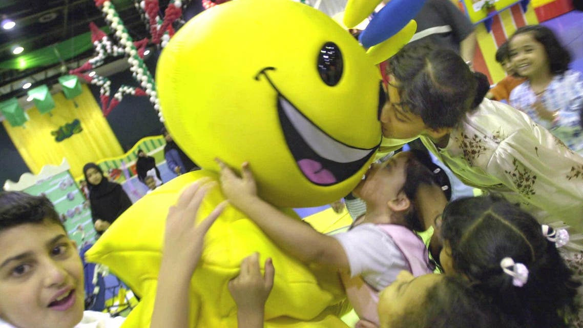 File photo of Arab children playing with Modhesh, the cartoon character at the Modhesh Fun City during Dubai Summer Surprises (AP)