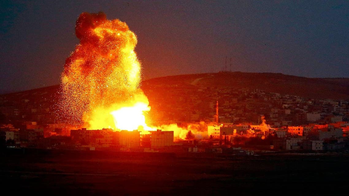 Smoke and flames rise over Syrian town of Kobane after an airstrike, as seen from the Mursitpinar border crossing on the Turkish-Syrian border. (File photo: Reuters)