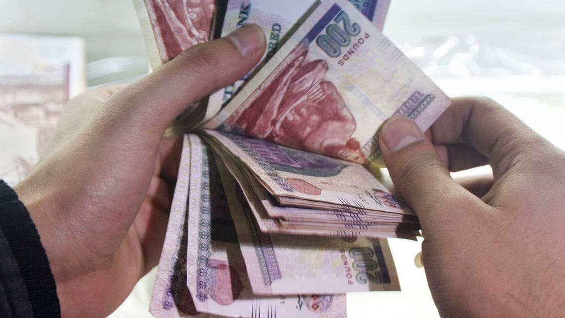 Egyptian currency at an exchange office in Cairo, Egypt AP