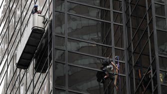 Man scales Trump Tower in New York using rope and suction cups